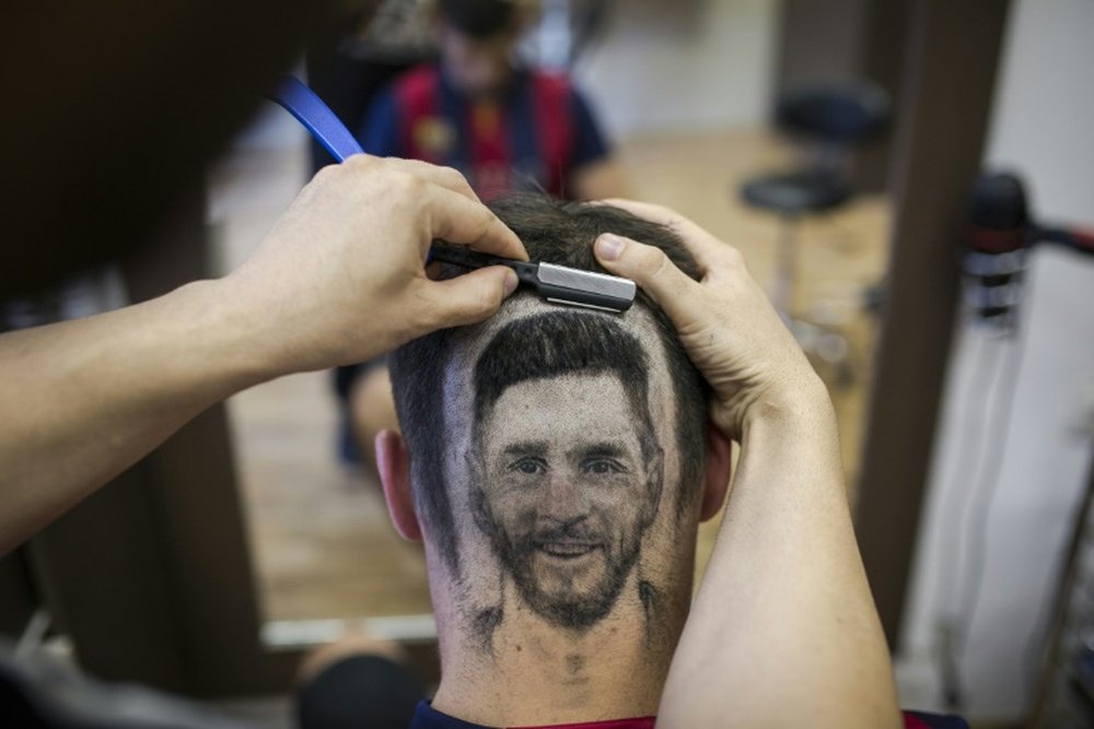 He calls them 'hair tattoos'. AFP