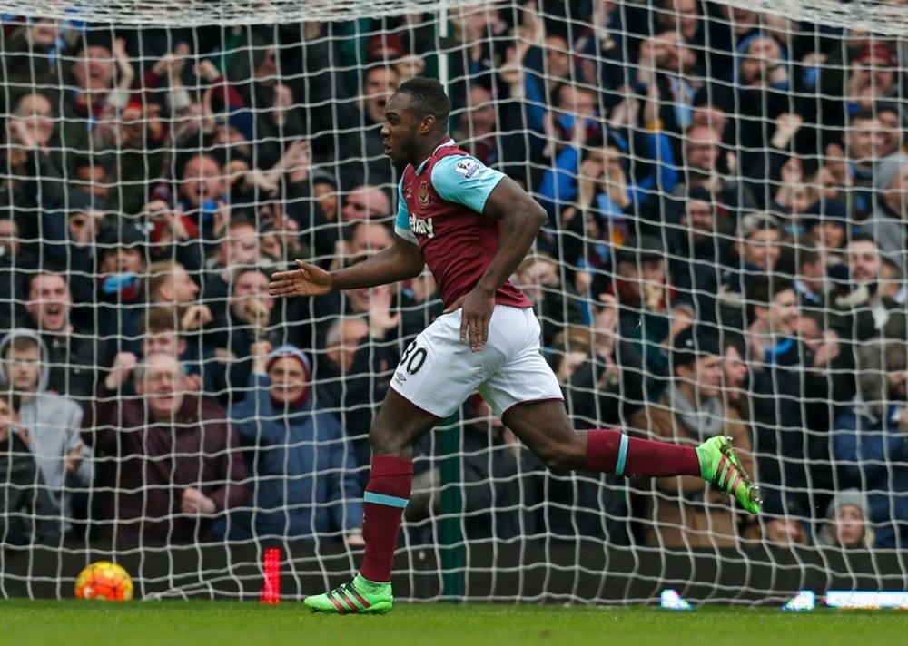 West Ham Uniteds midfielder Michail Antonio celebrates after scoring the opening goal of the English Premier League football match between West Ham United and Sunderland at The Boleyn Ground in Upton Park, in east London on February 27, 2016