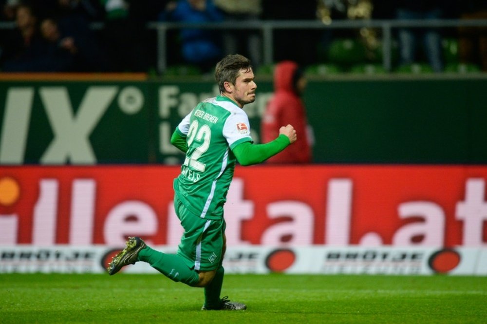 Bremens midfielder Fin Bartels celebrates after scoring a goal during a football match in Bremen, Germany, on January 30, 2016