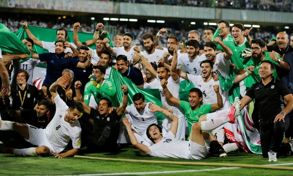 Iranian players celebrate after winning the 2018 World Cup. AFP
