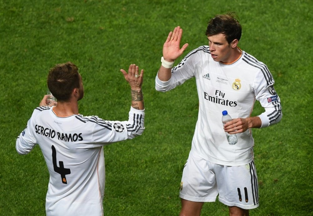 Real Madrids Gareth Bale (R) pictured here with his teammate Sergio Ramos during the 2014 Champions League final against Atletico Madrid