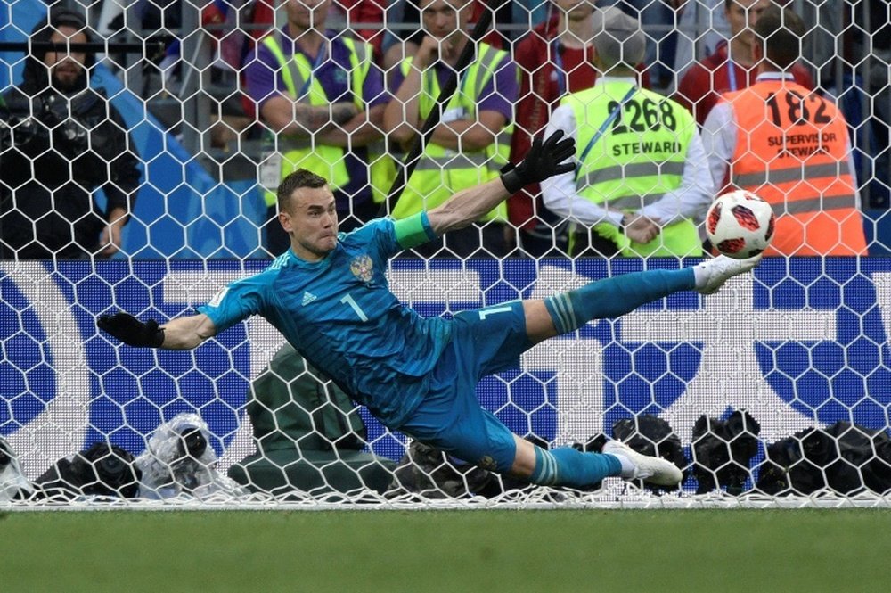 Akinfeev saved two penalties to send Russia through. AFP