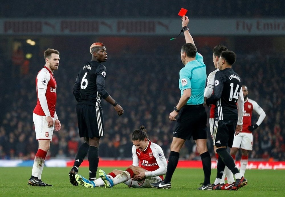 Pogba vio la roja en el minuto 74 del partido ante el Arsenal. AFP