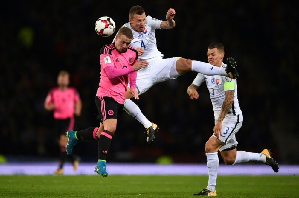 Last-gasp Scotland keep World Cup dream alive. AFP