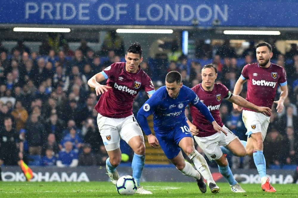 Eden Hazard in action for Chelsea last night against West Ham United. AFP