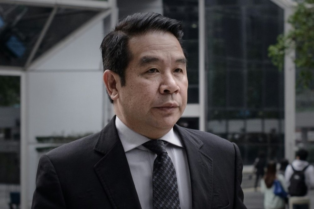 Birmingham Citys jailed former owner Carson Yeung arriving at the Wanchai district court in Hong Kong on May 3, 2013