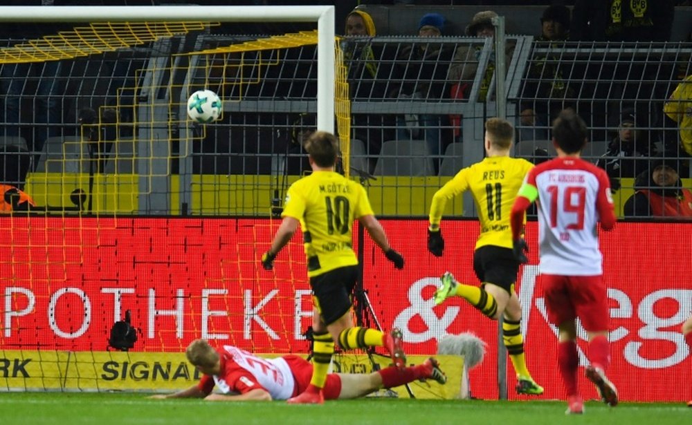 Reus strikes again as Dortmund held by Augsburg. AFP