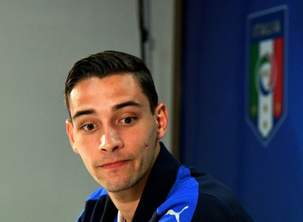 Mattia De Sciglio is closing in on a move to Juventus. AFP