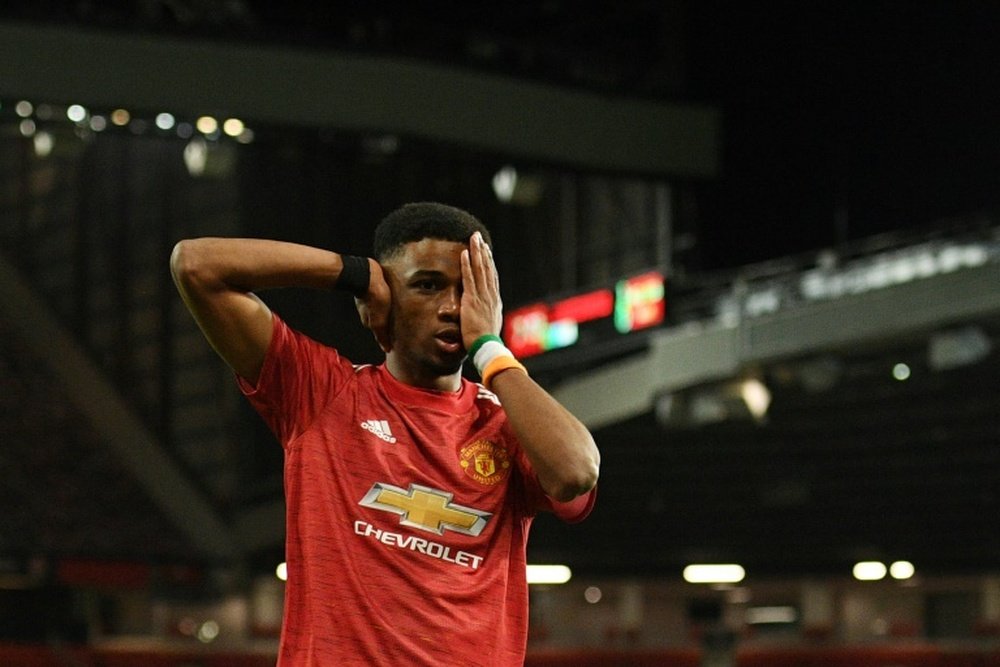 Manchester United's Amad Diallo celebrates scoring against AC Milan. AFP