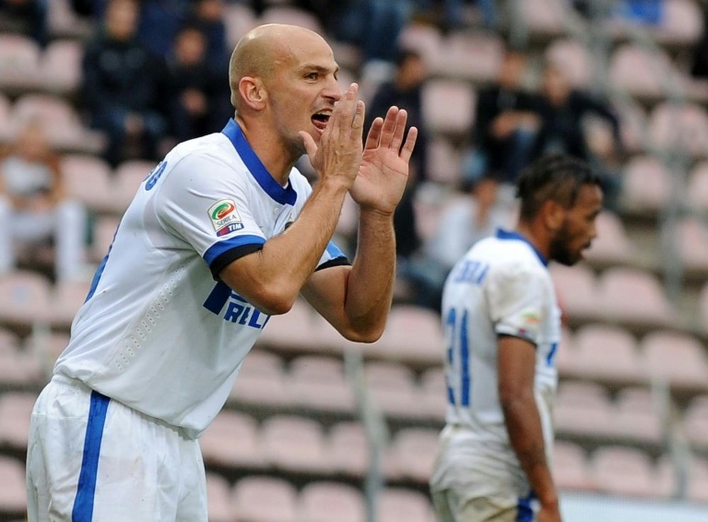 Argentine midfielder Esteban Cambiasso, pictured here on September 29, 2013, signed for Greek champions Olympiakos