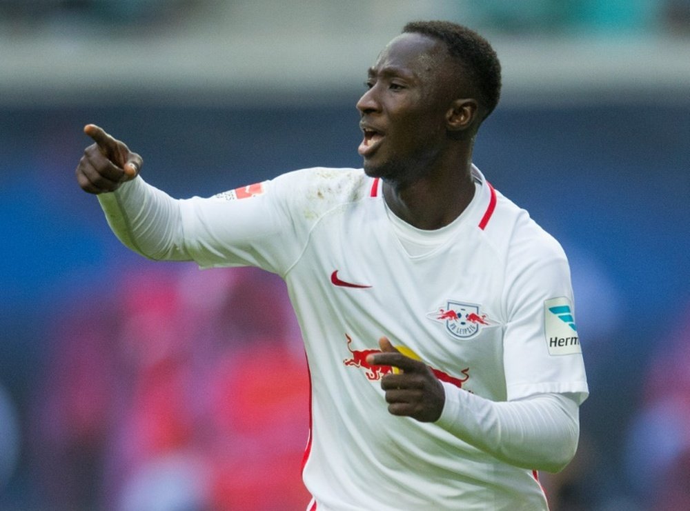 Leipzig's captain Orban is happy to play another season with Naby Keita. AFP