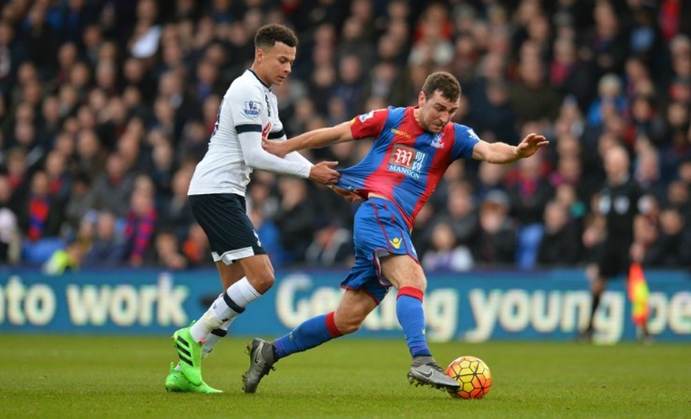 McArthur pictured up against Tottenham's Dele Alli. AFP