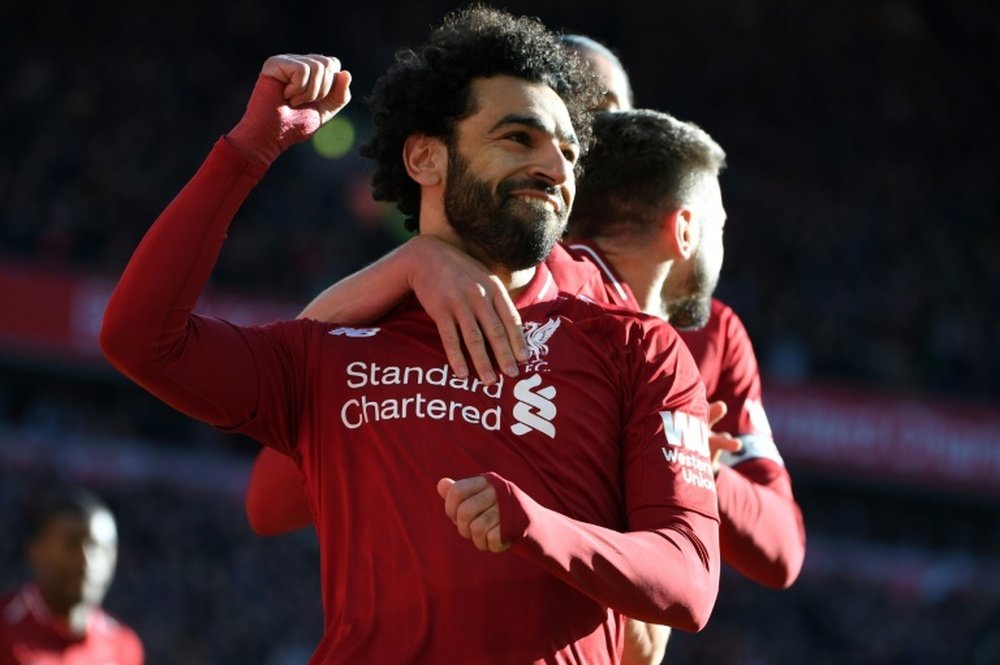 Salah celebrates scoring the opening goal in Liverpool's 4-1 win over Cardiff at Anfield. AFP