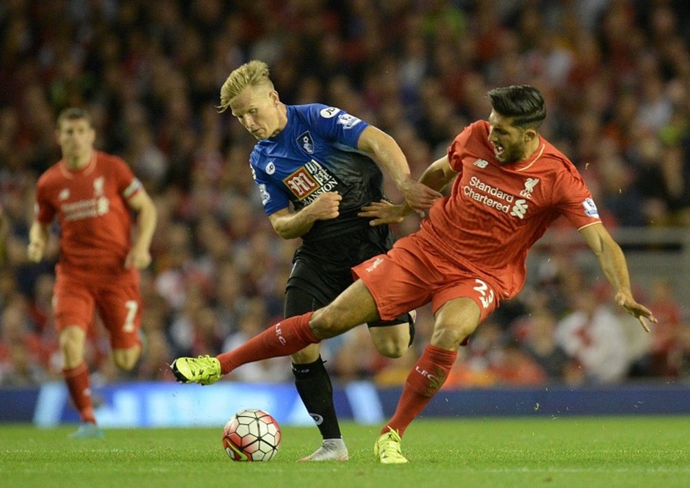 Emre Can (right) outplays Bournemouths Matt Ritchie during a Premier League game at Anfield on August 17, 2015