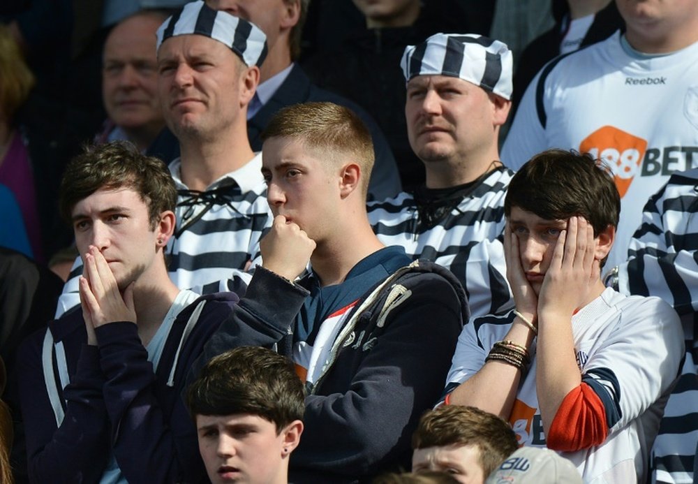 Bolton players are striking due to unpaid and late wages. AFP