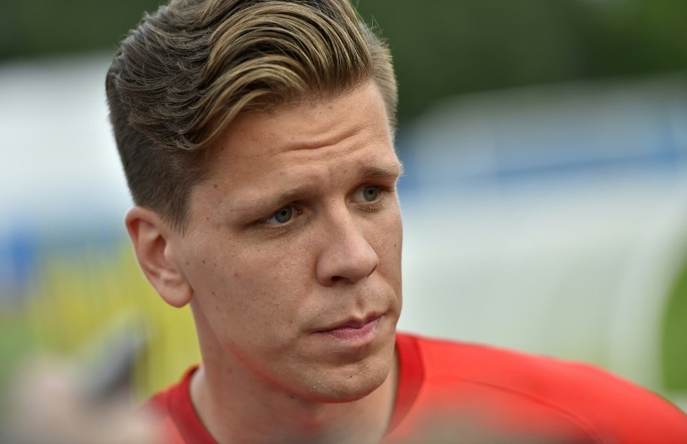 Szczesny says he's happy to be back in Rome. AFP