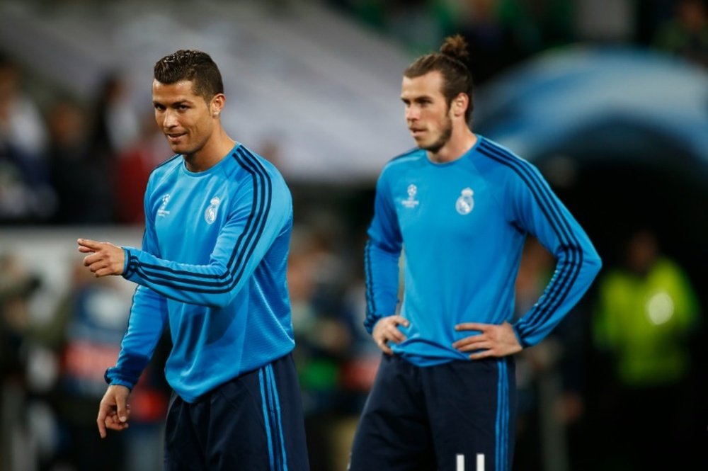 Ronaldo (L) will face club team-mate Bale tomorrow night in the Euro 2016 semi-finals. BeSoccer
