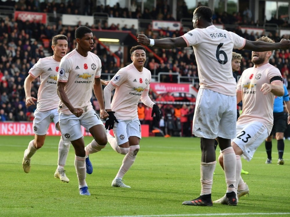 Rashford celebrates scoring the winner. AFP