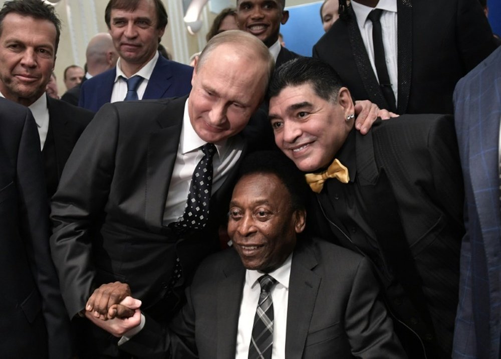 Putin welcomed football's legends to Moscow. AFP