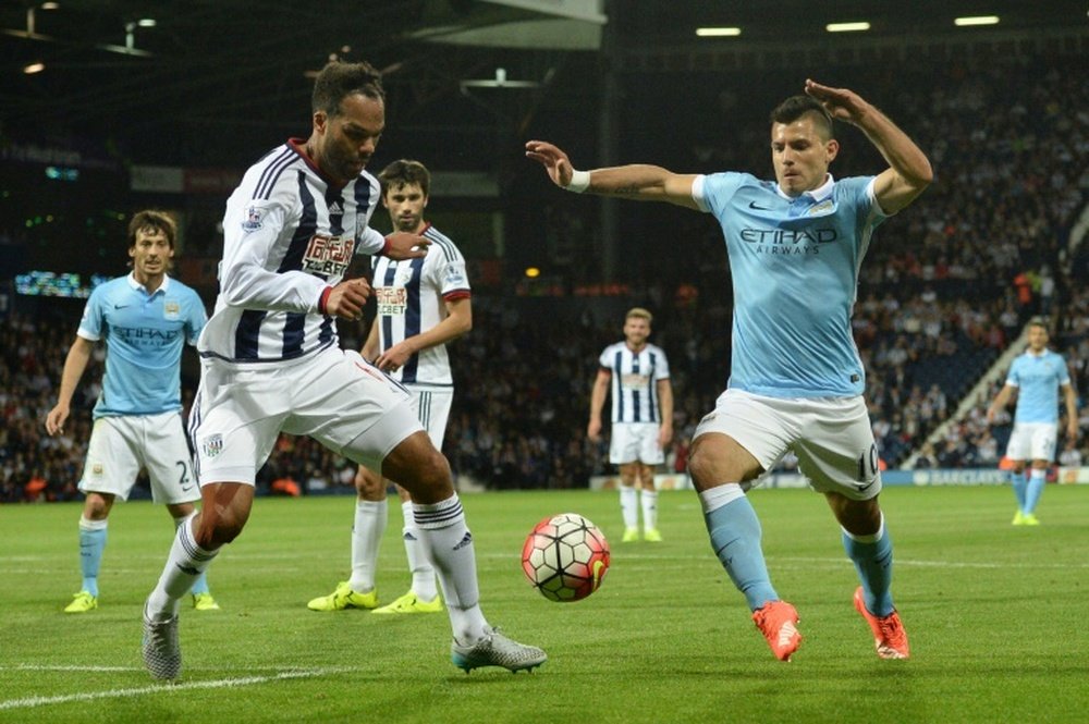 Former West Brom defender backs Moore for the coaching spot. AFP