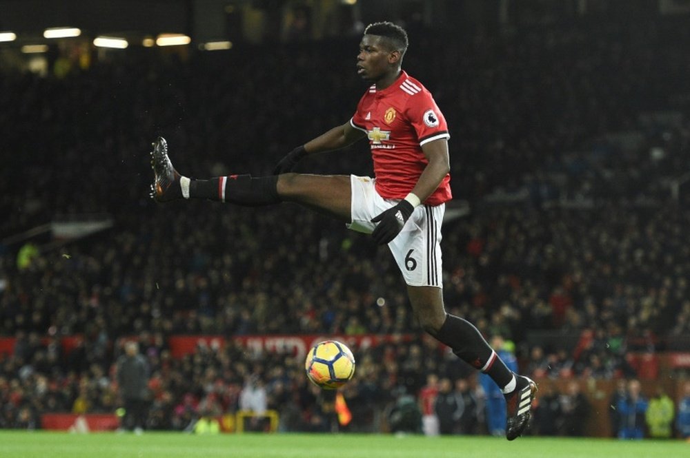 Pogba: United want to catch City. AFP