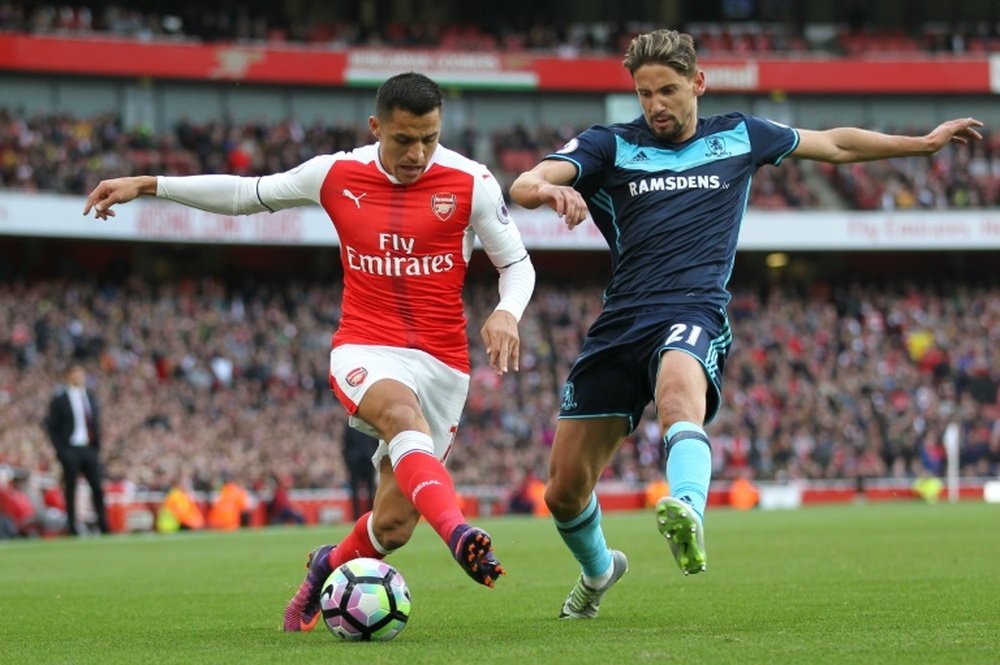 Alexis (L) in action for Arsenal against Middlesbrough. AFP