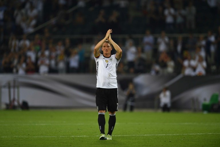Schweinstieger reached his aim. AFP