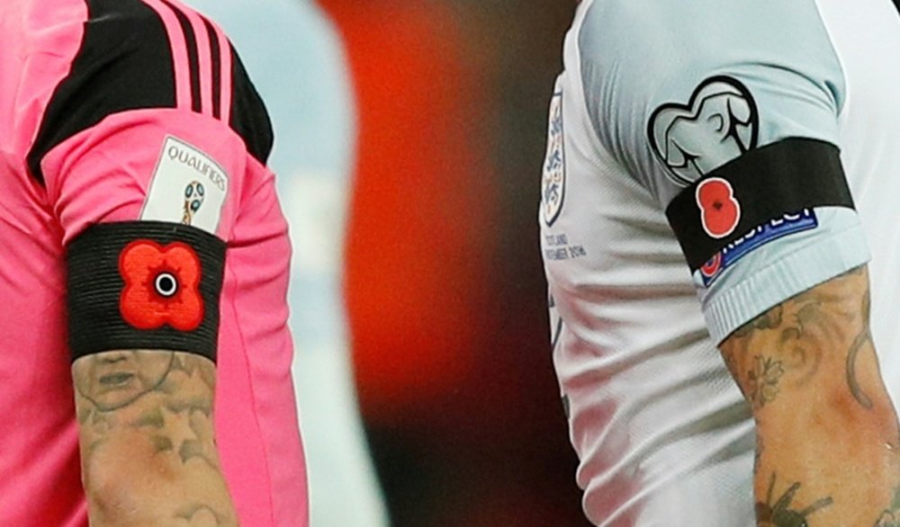 Last year FIFA fined England and Scotland for displaying the poppy on their armbands. AFP