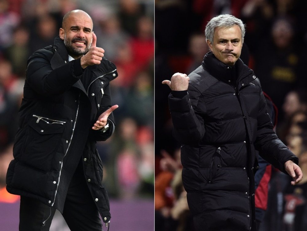 Manchester Citys manager Pep Guardiola and Manchester Uniteds manager Jose Mourinho. AFP