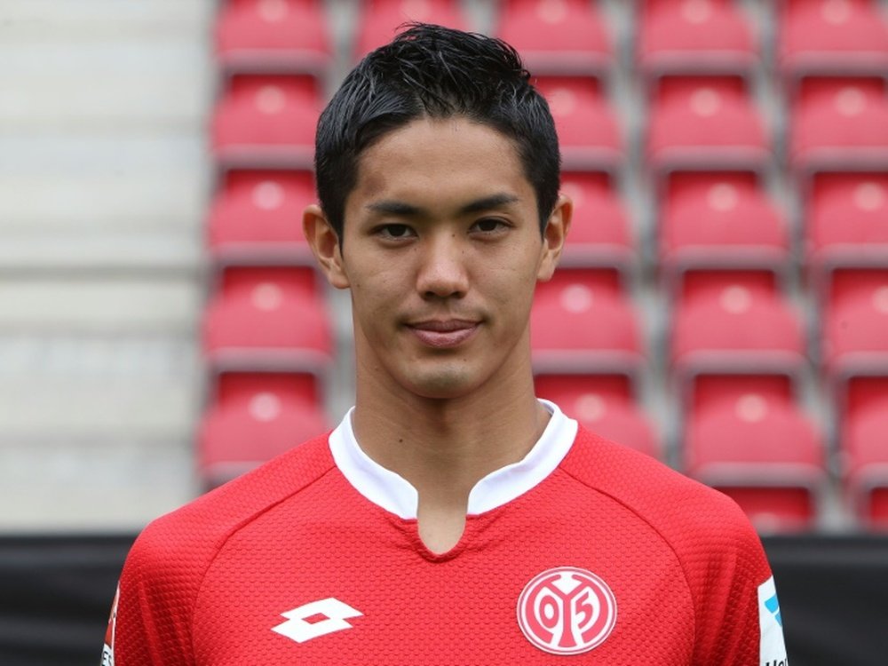 Mainz Japanese striker Yoshinori Muto poses for a photo during the team presentation in Mainz, western Germany, July 12, 2015