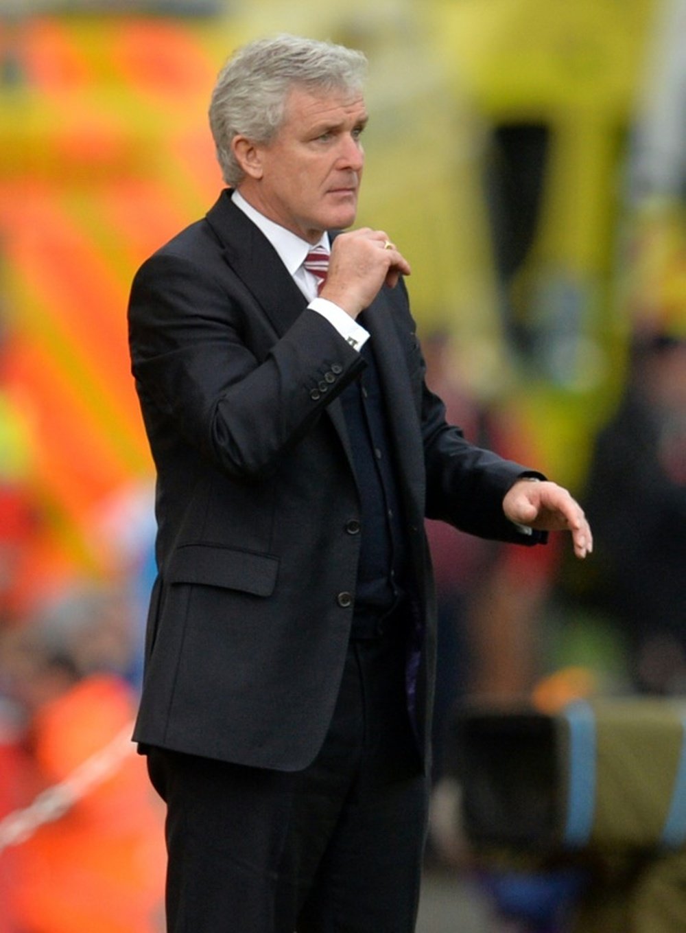 Mark Hughes is unhappy. AFP