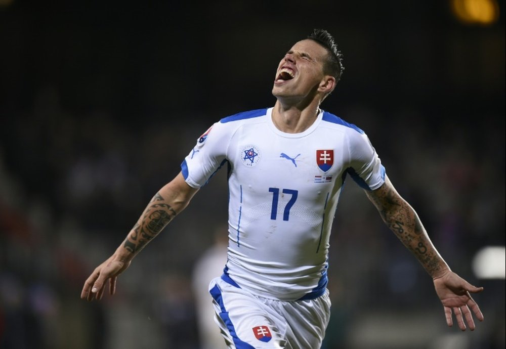 Slovakias midfielder Marek Hamsik celebrates after scoring during a Euro 2016 qualifying football match against Luxembourg at the Josy Barthel Stadium, on October 12, 2015 in Luxembourg