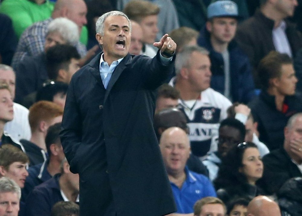 Chelseas manager Jose Mourinho signals during an English Premier League football match against Southampton at Stamford Bridge in London on October 3, 2015