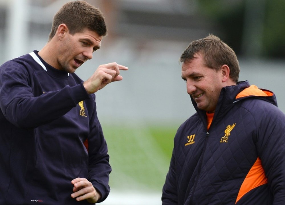 Gerrard (L) is in contact with the League One club. AFP