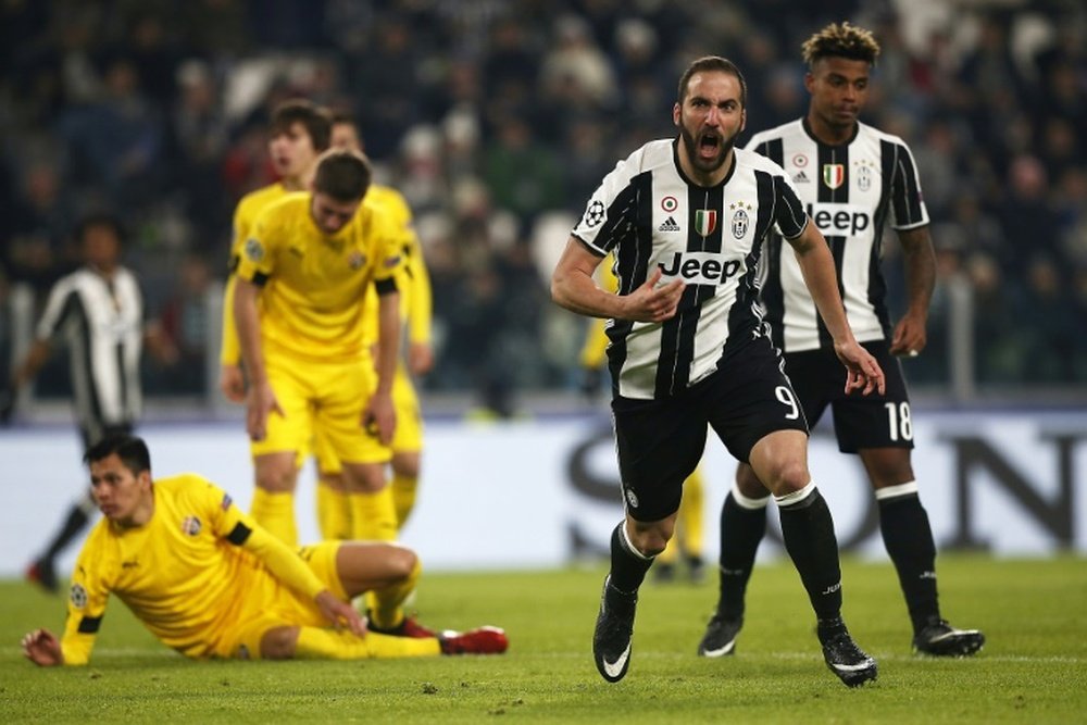 Juventus forward Gonzalo Higuain celebrates after scoring against Dinamo Zagreb. AFP