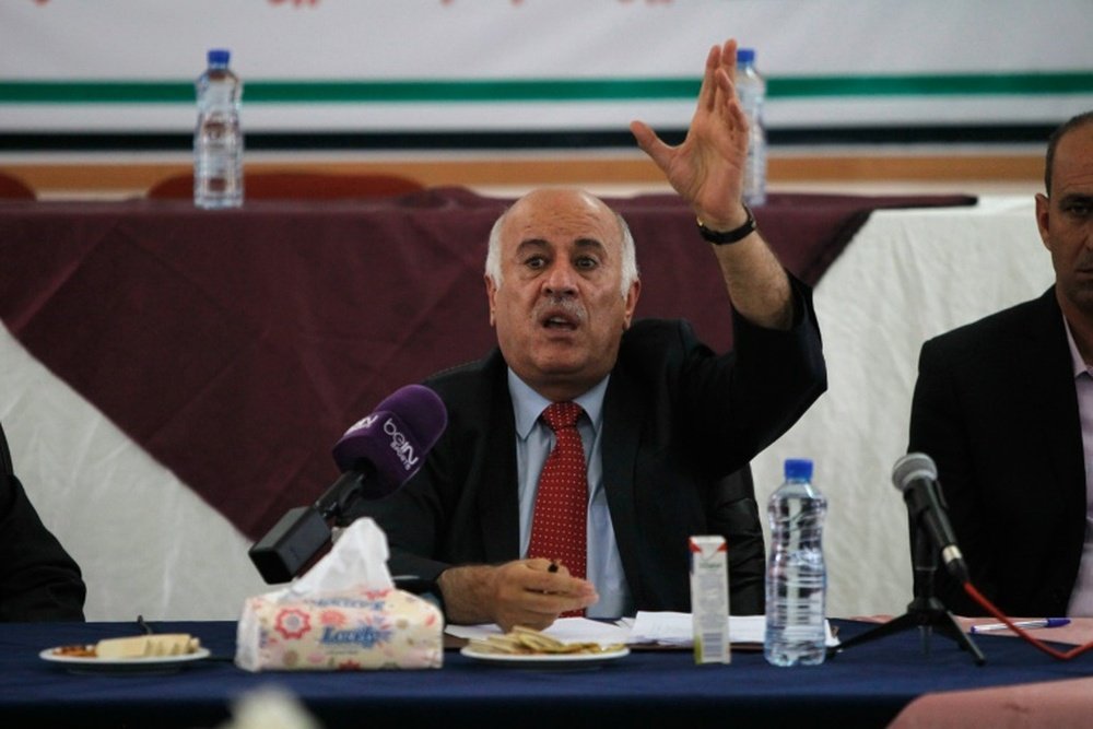 Palestinian Football Association (PFA) President Jibril Rajoub speaks during a meeting in the Israeli occupied city of Hebron announcing a decision to postpone a rare match between teams from the Gaza Strip and the West Bank, on July 30, 2016
