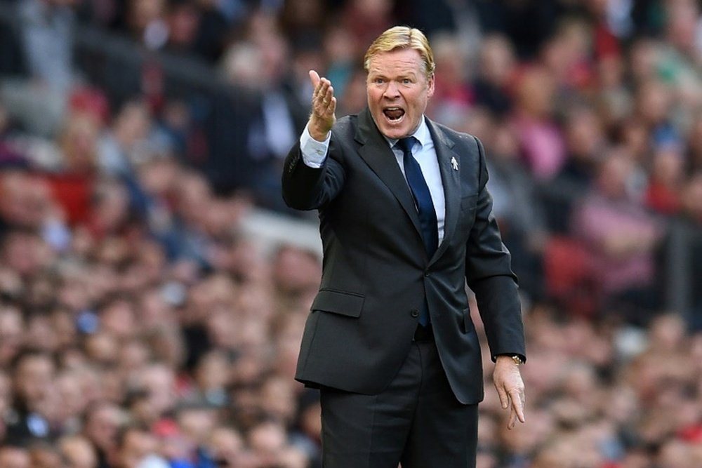 Koeman will be hoping Everton can continue their rediscovered form on Thursday evening. AFP