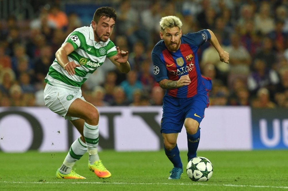 Barcelonas Argentinian forward Lionel Messi (R) scored a hat-trick whilst Neymar bagged four assists and goal against Celtic as the MSN took their combined early season tally to 13