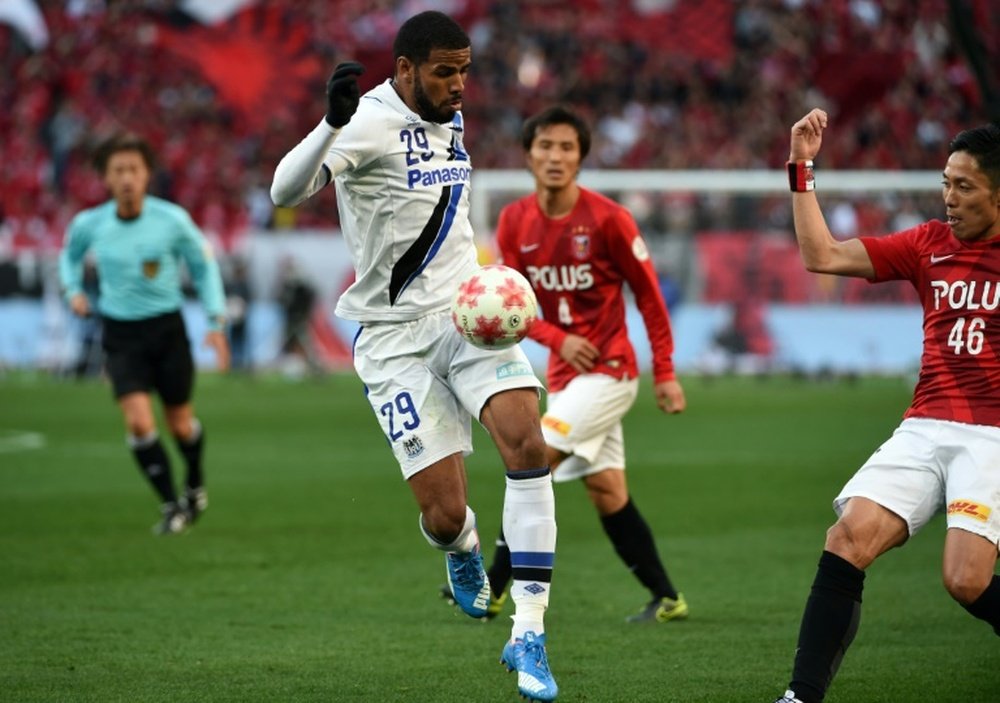Gamba Osakas Patric scored two goals to retain the Emperors Cup, beating Urawa Reds 2-1 in Tokyo on January 1, 2016