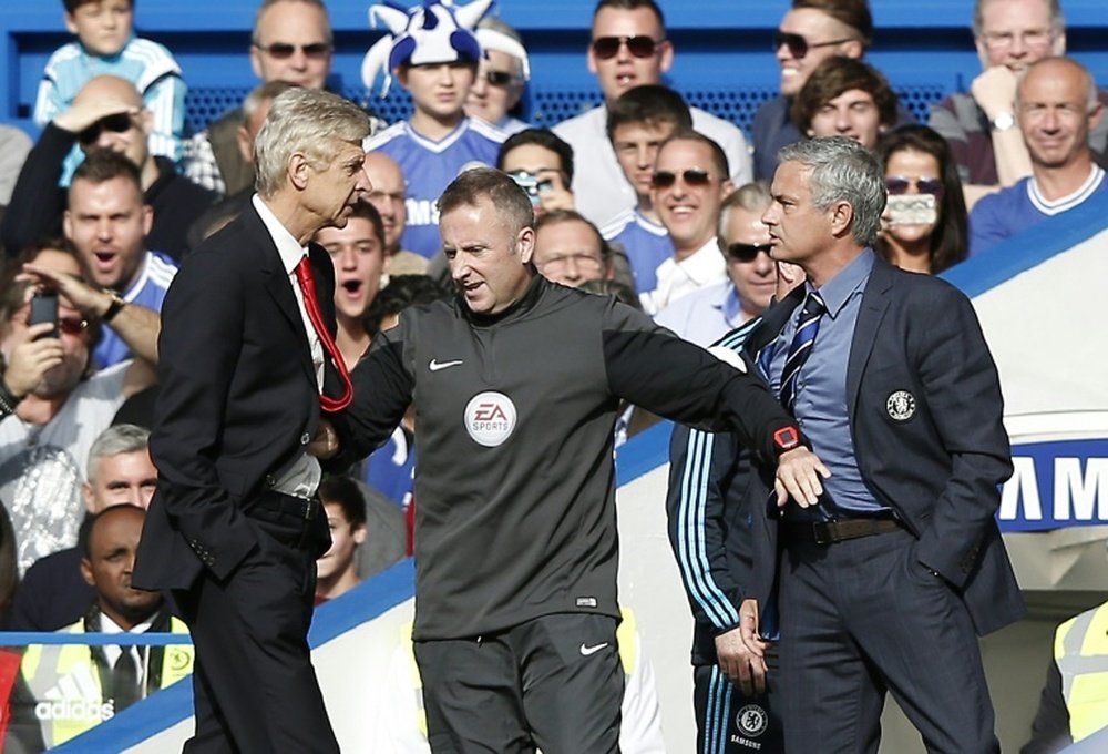 Despite their rivalry and a scuffle last season, pictured, Chelsea manager Jose Mourinho (R) believes manager Arsene Wengers (L) Arsenal are more than ready to challenge for the title this season