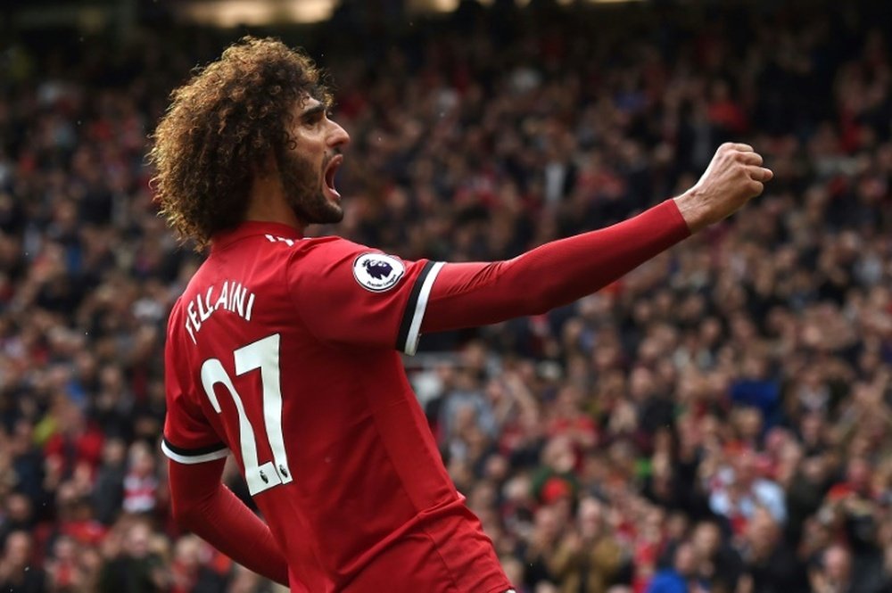 Reports claim that Arsenal are considering a shock swoop for Marouane Fellaini. AFP