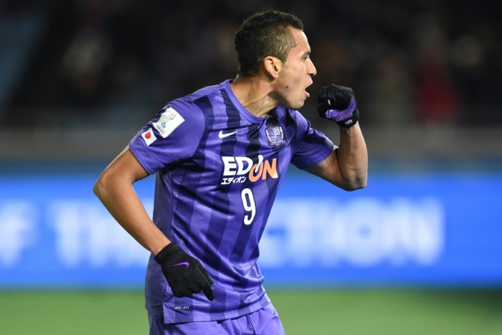 Sanfrecce Hiroshima forward Douglas celebrates after scoring against Guangzhou Evergrande during the third-place match at the Club World Cup in Yokohama, on December 20, 2015