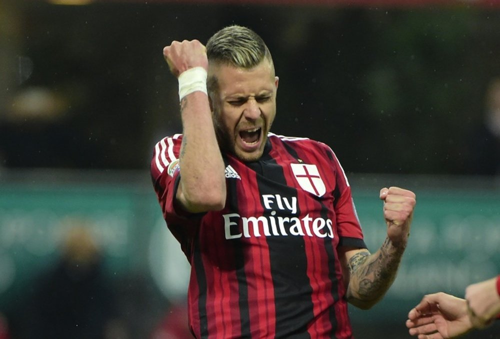 AC Milan midfielder Jeremy Menez celebrates after scoring a penalty during an Italian Serie A match against Cagliari at the San Siro Stadium stadium in Milan on March 21, 2015