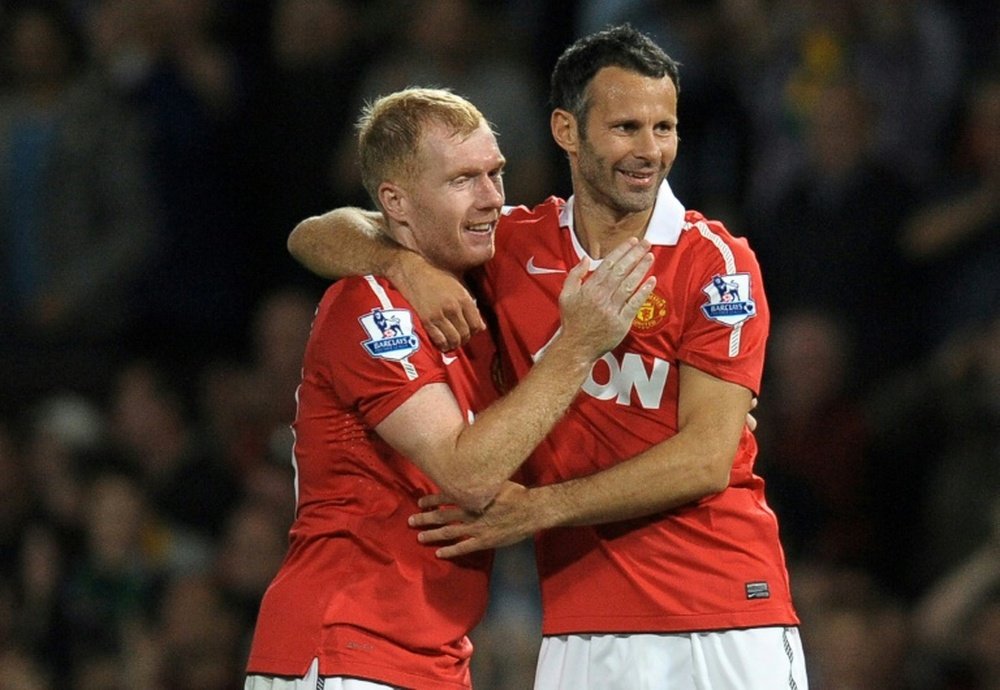 Manchester United legends Ryan Giggs (R) and Paul Scholes have angered Indian fans. AFP