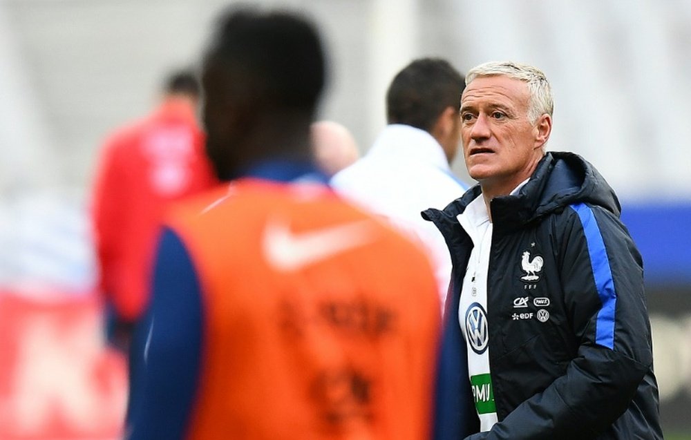 Frances head coach Didier Deschamps speaks during a training session at the Stade de France stadium on October 6, 2016