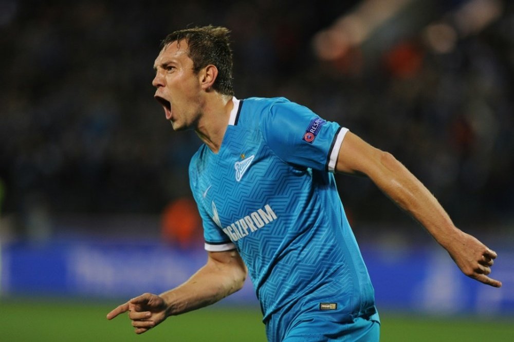 Zenits Russian forward Artem Dzyuba celebrates a goal during a UEFA Champions League group H football match against Gent at the Petrovsky stadium in St. Petersburg on September 29, 2015