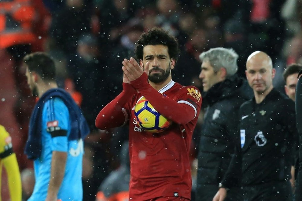 Salah firmó un póker ante el Watford. AFP