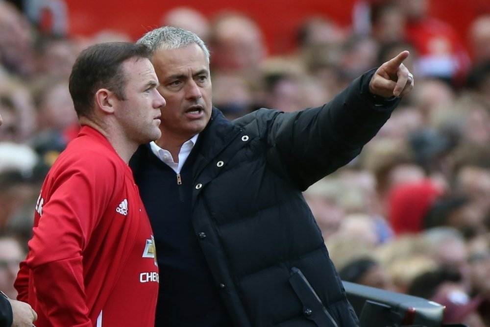 O técnico português quer que Rooney continue no time. AFP
