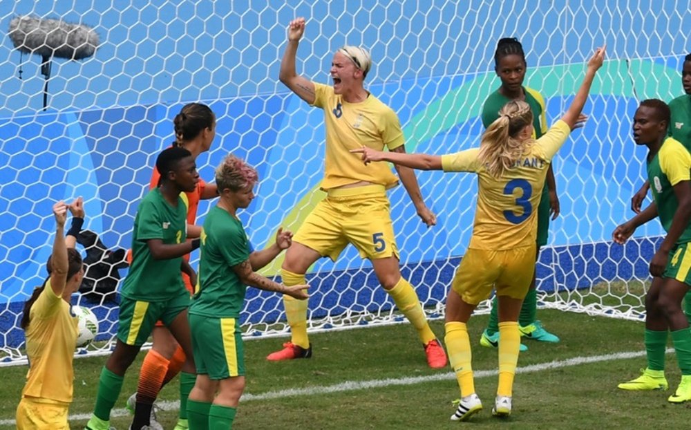 Swedens Nilla Fischer (C) celebrates her goal against South Africa. AFP