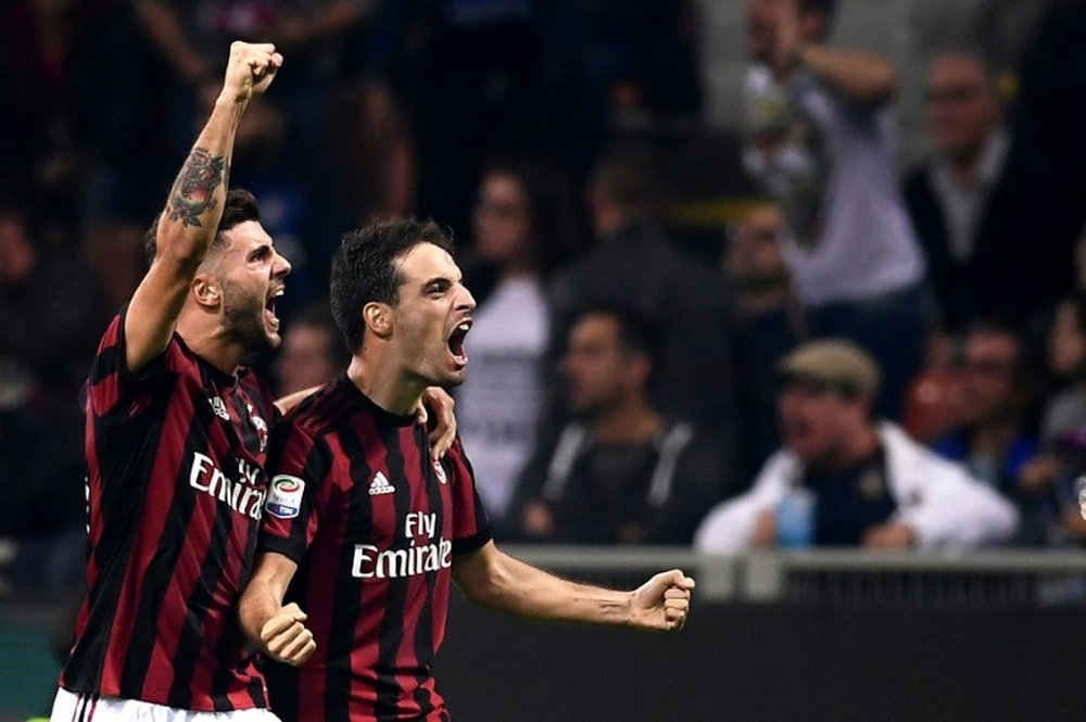 O Milan está de regresso aos triunfos na liga. AFP